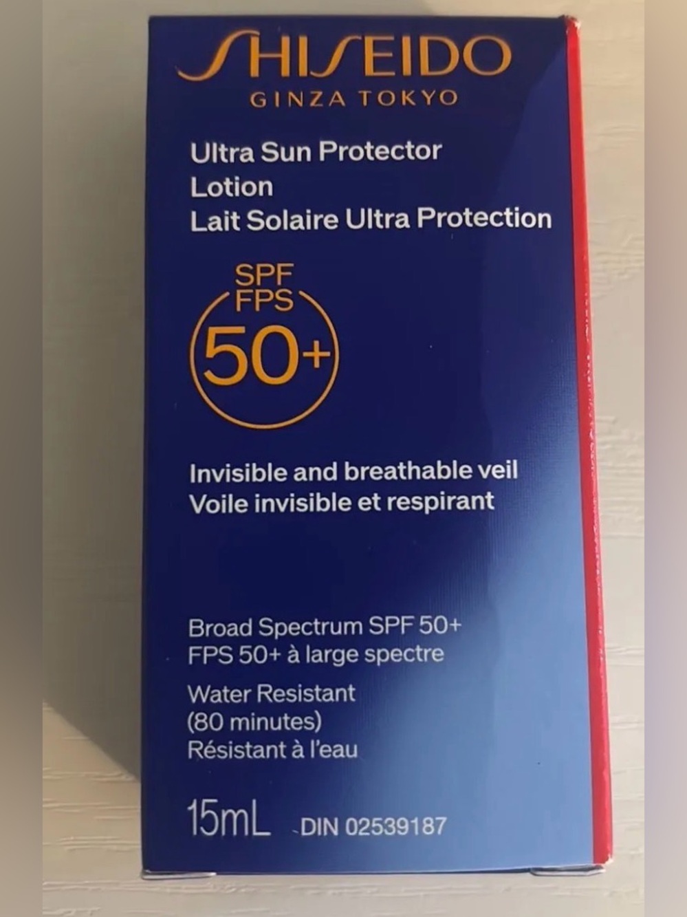 Shiseido Ultra Sun Protector Lotion - Navy Blue with Red Trim
